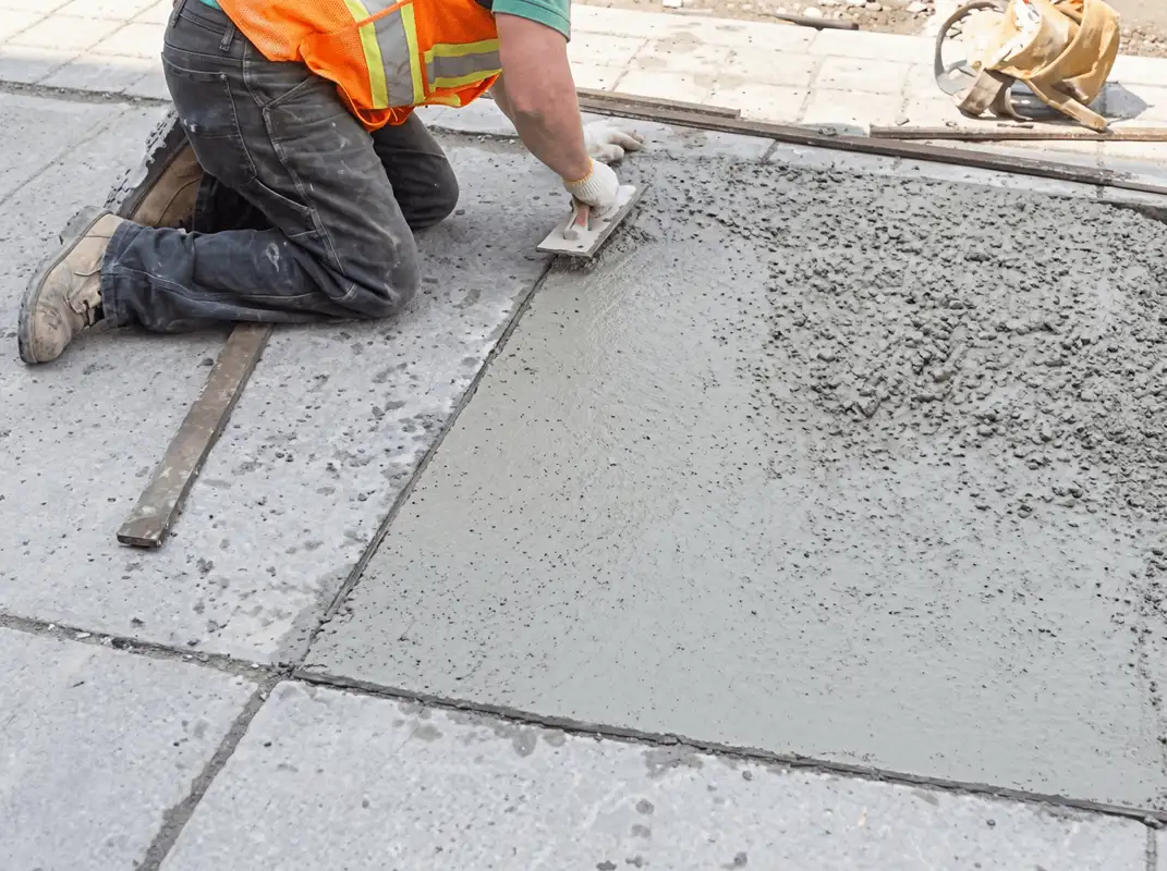 Professional repairing a concrete floor in Spokane, WA