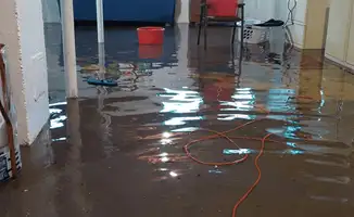 Basement with boiler, cabinets and washing machine completely flooded in Spokane, WA